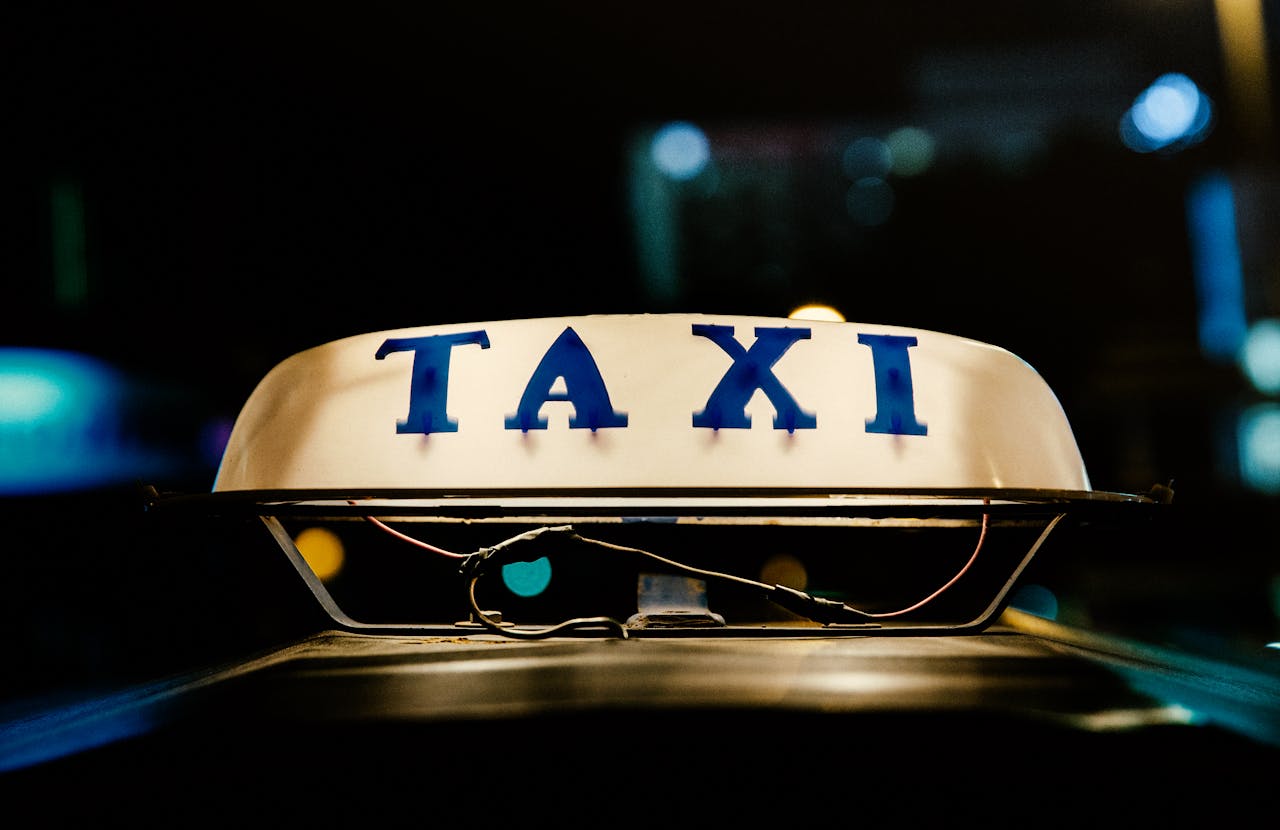 Macro Shot Photography of Taxi Lamp